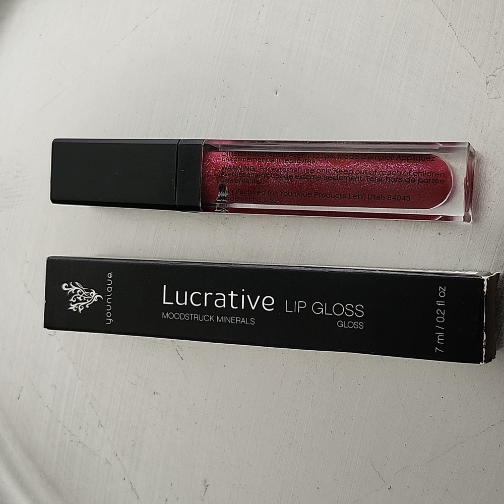 Younique lip gloss. New boxed product and a free tester. Love this gloss